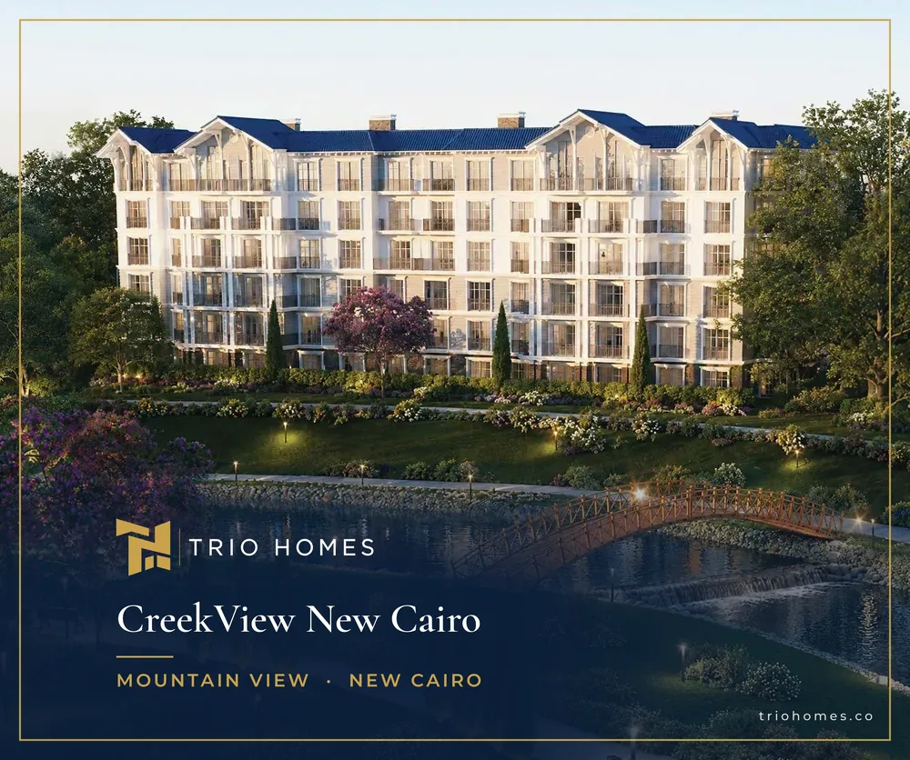 Rendering of a residential building overlooking a water feature and footbridge at CreekView, New Cairo