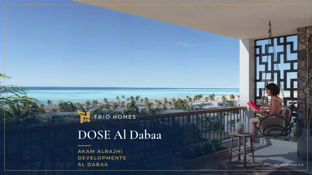 Woman relaxing on a balcony overlooking pools, green areas and the sea at DOSE, North Coast