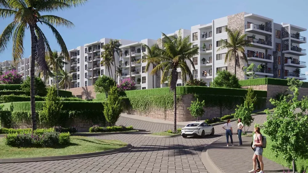 DOSE Al Dabaa chalet buildings Rendering of chalet buildings with palm trees and an internal road at DOSE, Al Dabaa