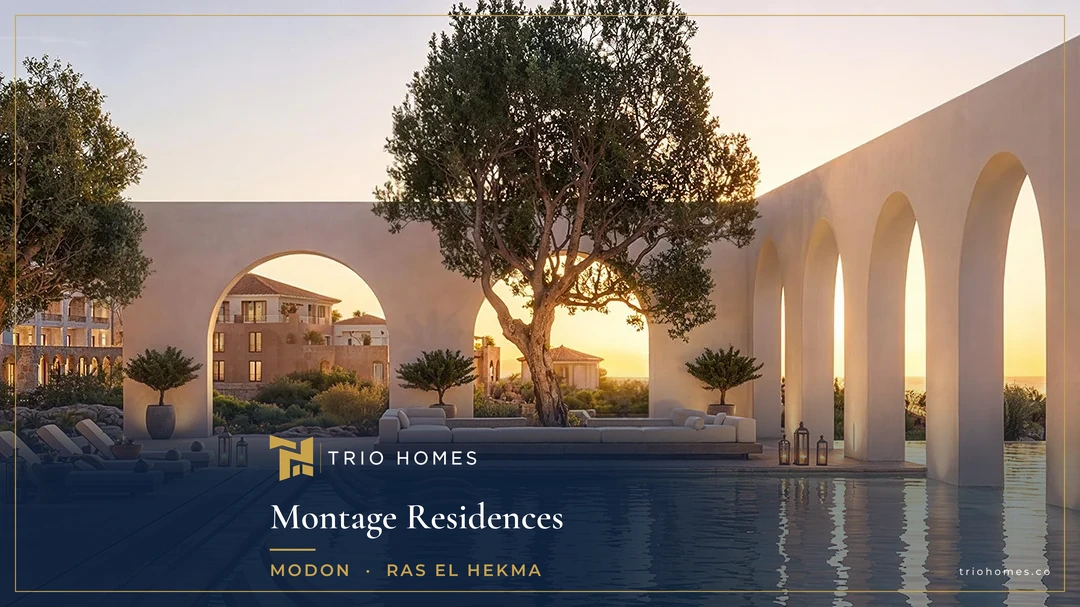 Pool and stone arches at sunset at Montage Residences Ras El Hekma