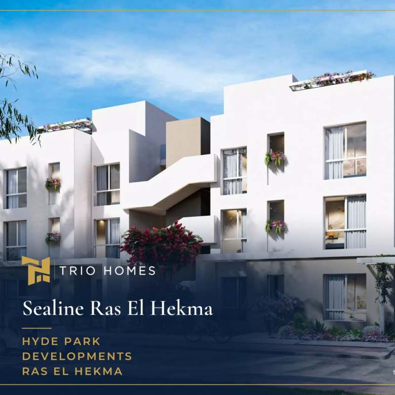 White residential buildings and landscaped street with golf cart in Sealine, Ras El Hekma