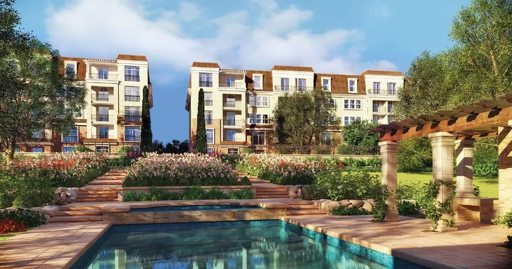 Sarai New Cairo landscaped pool and garden Rendering of a landscaped pool and garden walkway between residential buildings at Sarai, New Cairo