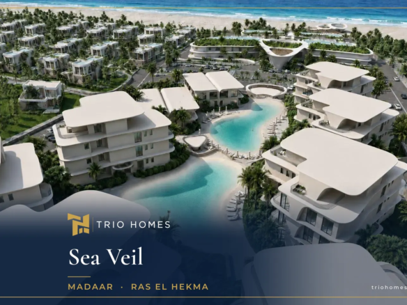 Aerial rendering of white residential buildings around lagoons near the beach at Sea Veil by Madaar, Ras El Hekma