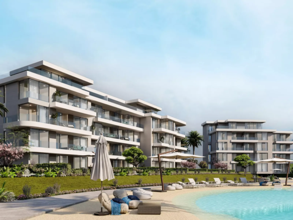 Rendering of low-rise residential buildings beside a lagoon beach at Hyde Park's Seashore community, Ras El Hekma
