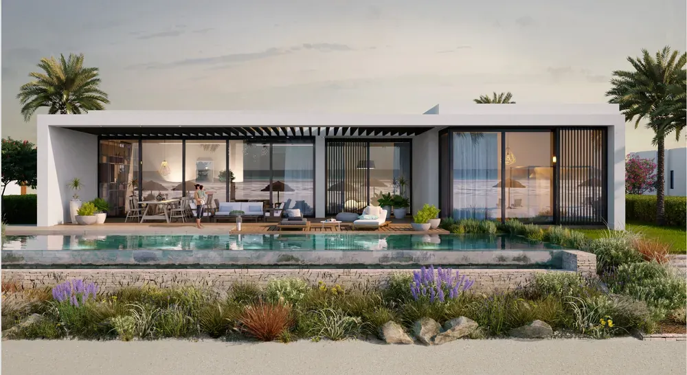 Silversands North Coast home with pool terrace Rendering of a Silversands home with floor-to-ceiling glass opening onto a pool terrace and garden