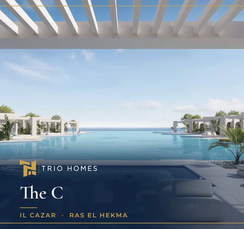 Rendering of a shaded pool terrace with loungers facing a lagoon and the sea at The C by IL Cazar, Ras El Hekma
