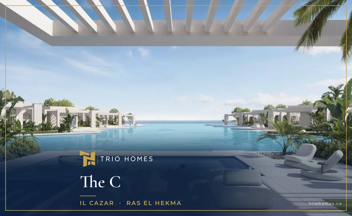 The C pool terrace and lagoon Rendering of a shaded pool terrace with loungers facing a lagoon and the sea at The C by IL Cazar, Ras El Hekma