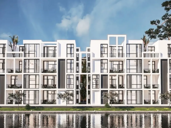 Rendering of white low-rise residential buildings reflected in a lagoon at The Island, Zahra, Al Alamein
