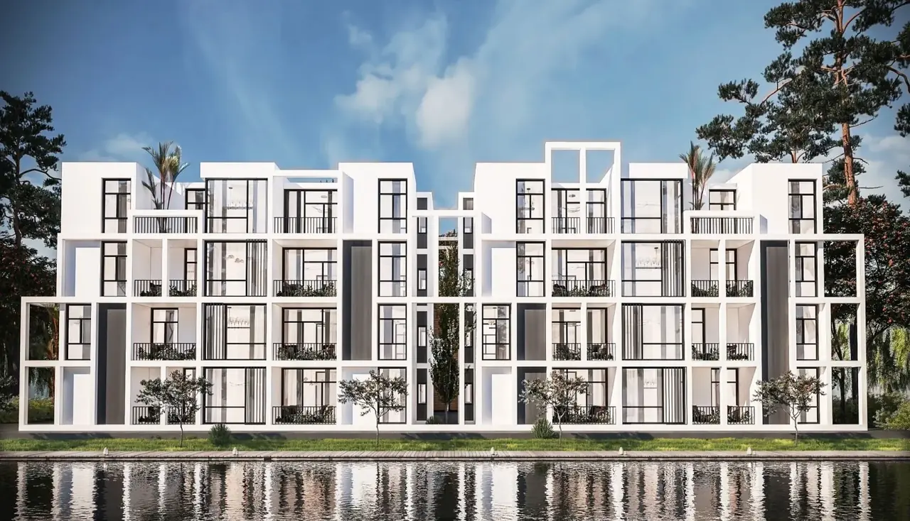 The Island Zahra Al Alamein waterfront buildings Rendering of white low-rise residential buildings reflected in a lagoon at The Island, Zahra, Al Alamein