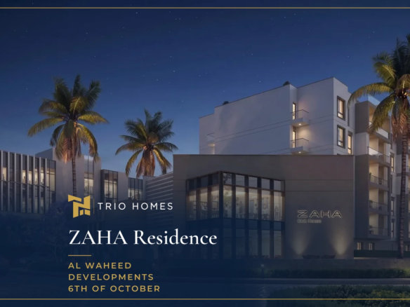 Clubhouse and apartment buildings at night at ZAHA Residence 6th of October